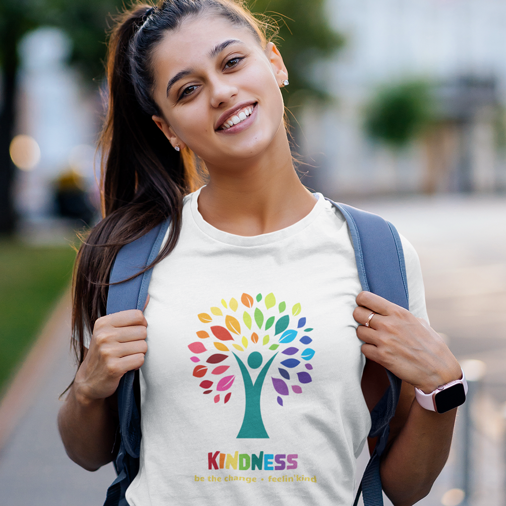 pretty girl wearing colorful kindness tree tee